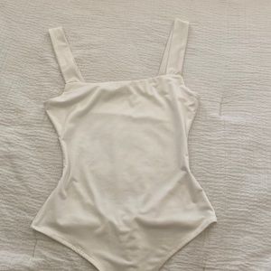 Open back white bodysuit